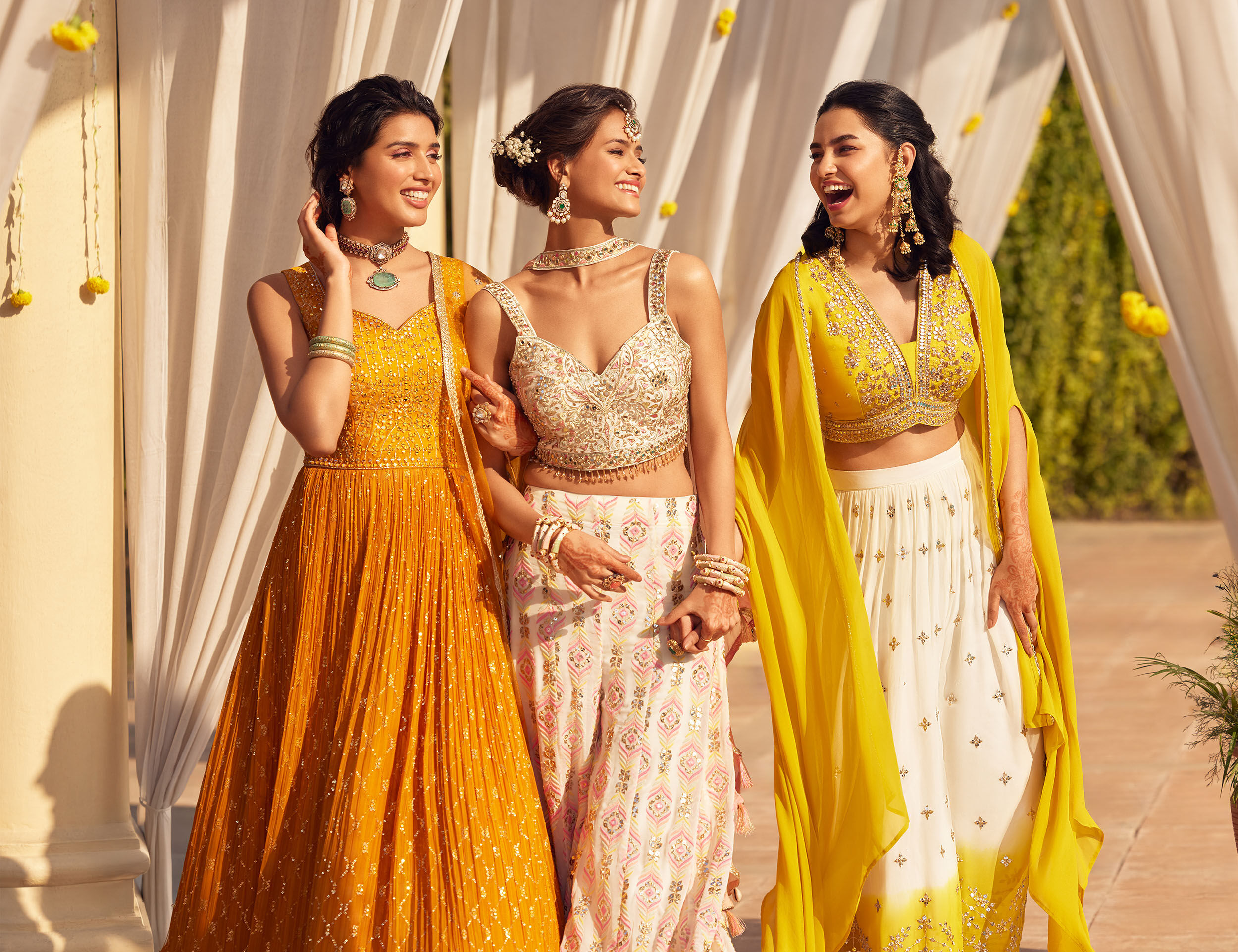 Indian bride and bridesmaid wearing traditional wears on wedding ceremony.